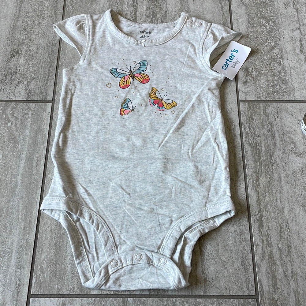 Carter’s baby cream 24m onesie/bodysuit,round neck,sleeveless with ruffles/girls